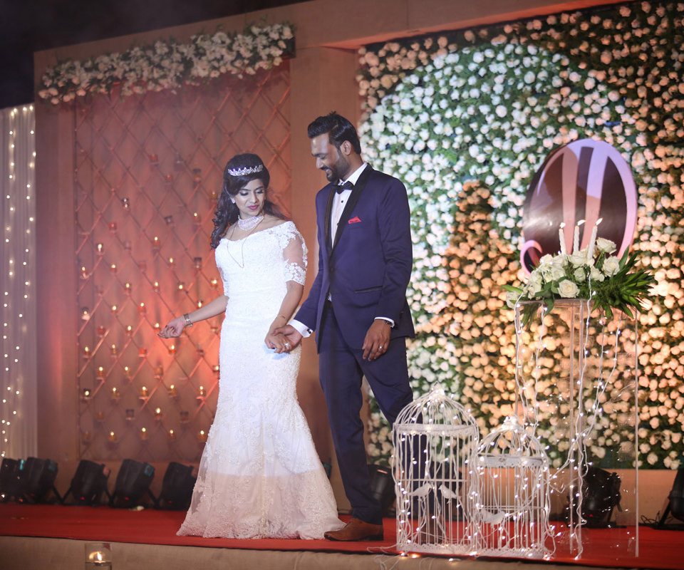 Elegant floral arrangements and sophisticated lighting - Logic Events